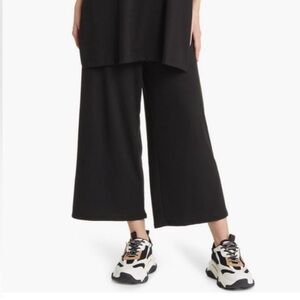 Dressed in Lala Cropped Wide Ribbed Playsuit Pants | Black | Size Medium